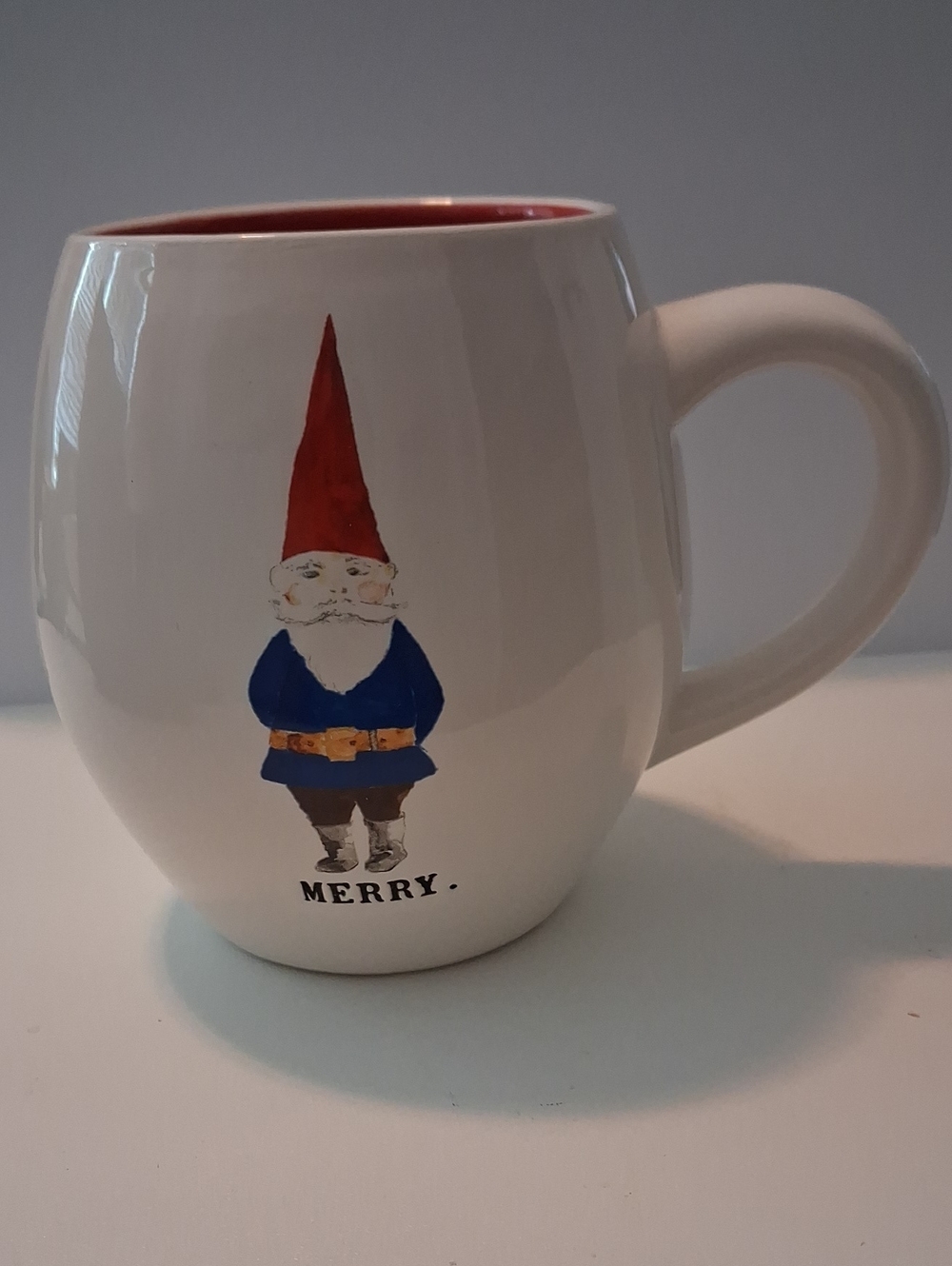 Rae Dunn White Mug with Red Interior and Blue Gnome